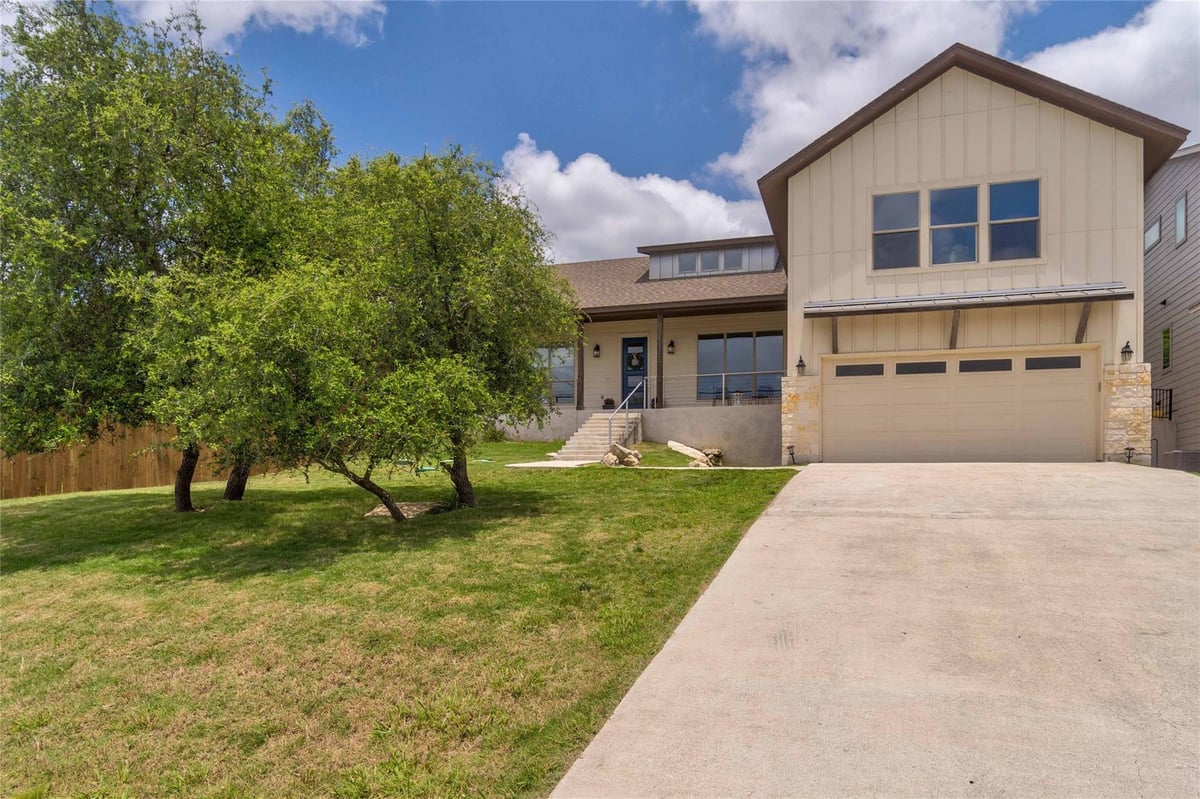 View 10129 Longhorn Skwy in Twin Lake Hills 10129 Longhorn Skwy - front exterior - Luxury home in Twin Lake Hills, Dripping Springs, TX