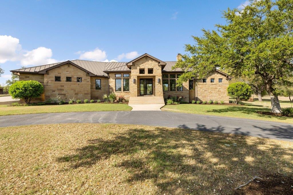 View 10150 FM 967 in Thomas W Moore 10150 FM 967 - front exterior - Luxury home in Thomas W Moore, Buda, TX
