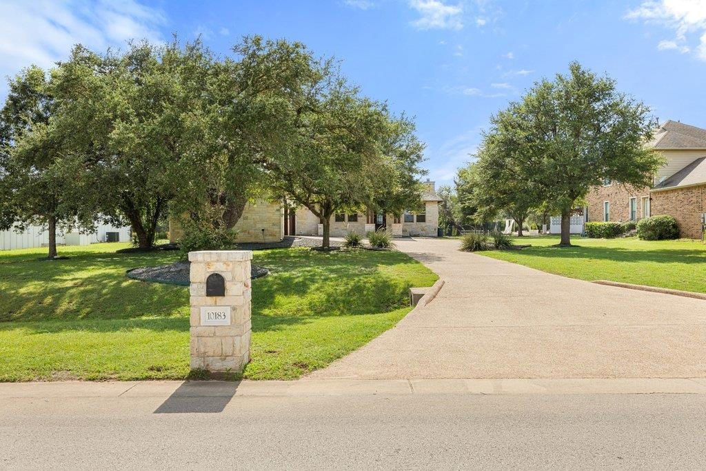 View 10183 Brangus RD in Rutherford West 10183 Brangus RD - property photo 1 - Luxury home in Rutherford West, Driftwood, TX