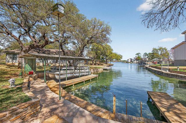 View 102 Cove LN in Granite Shoals Lake Estates 102 Cove LN - front exterior - Luxury home in Granite Shoals Lake Estates, Sunrise Beach, TX