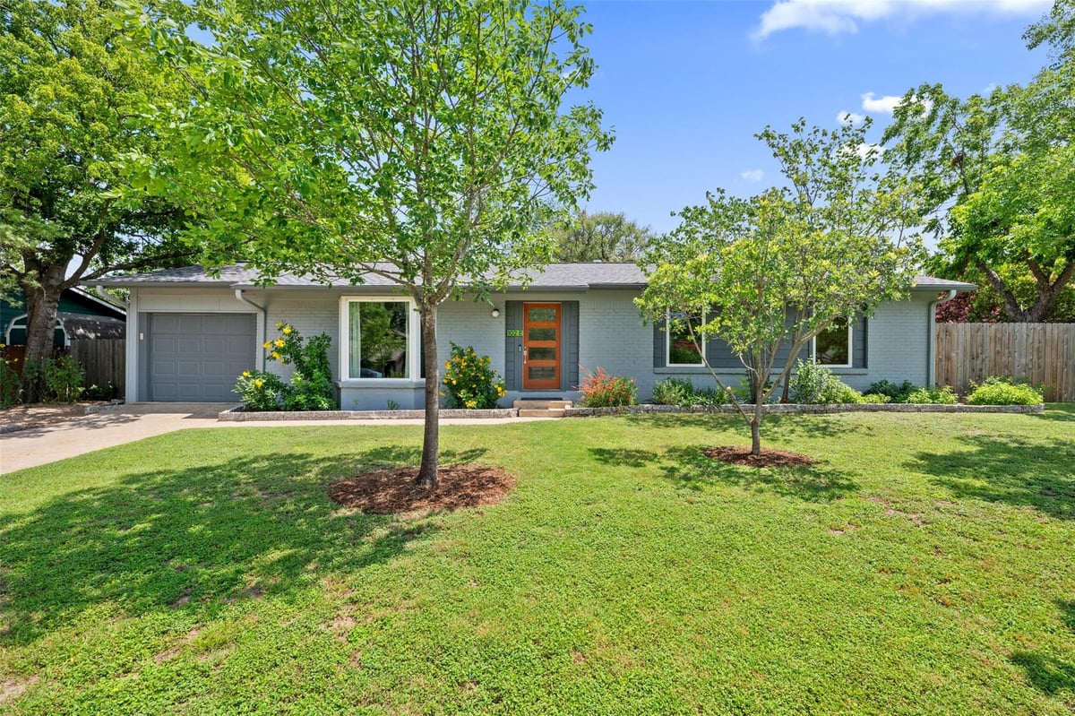 View 102 E Crestland DR in Holiday Hills Sec 01 102 E Crestland DR - front exterior - Luxury home in Holiday Hills Sec 01, Austin, TX