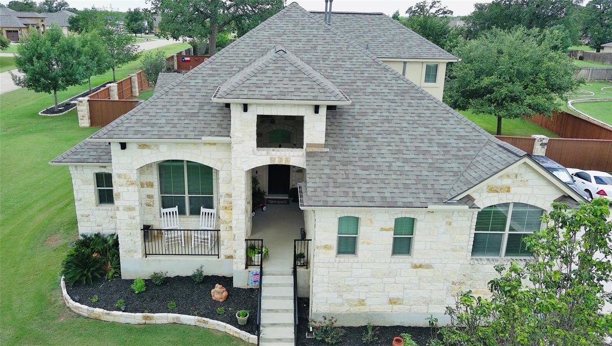 View 102 McCoy CIR in THE COLONY 102 McCoy CIR - front exterior - Luxury home in THE COLONY, Bastrop, TX
