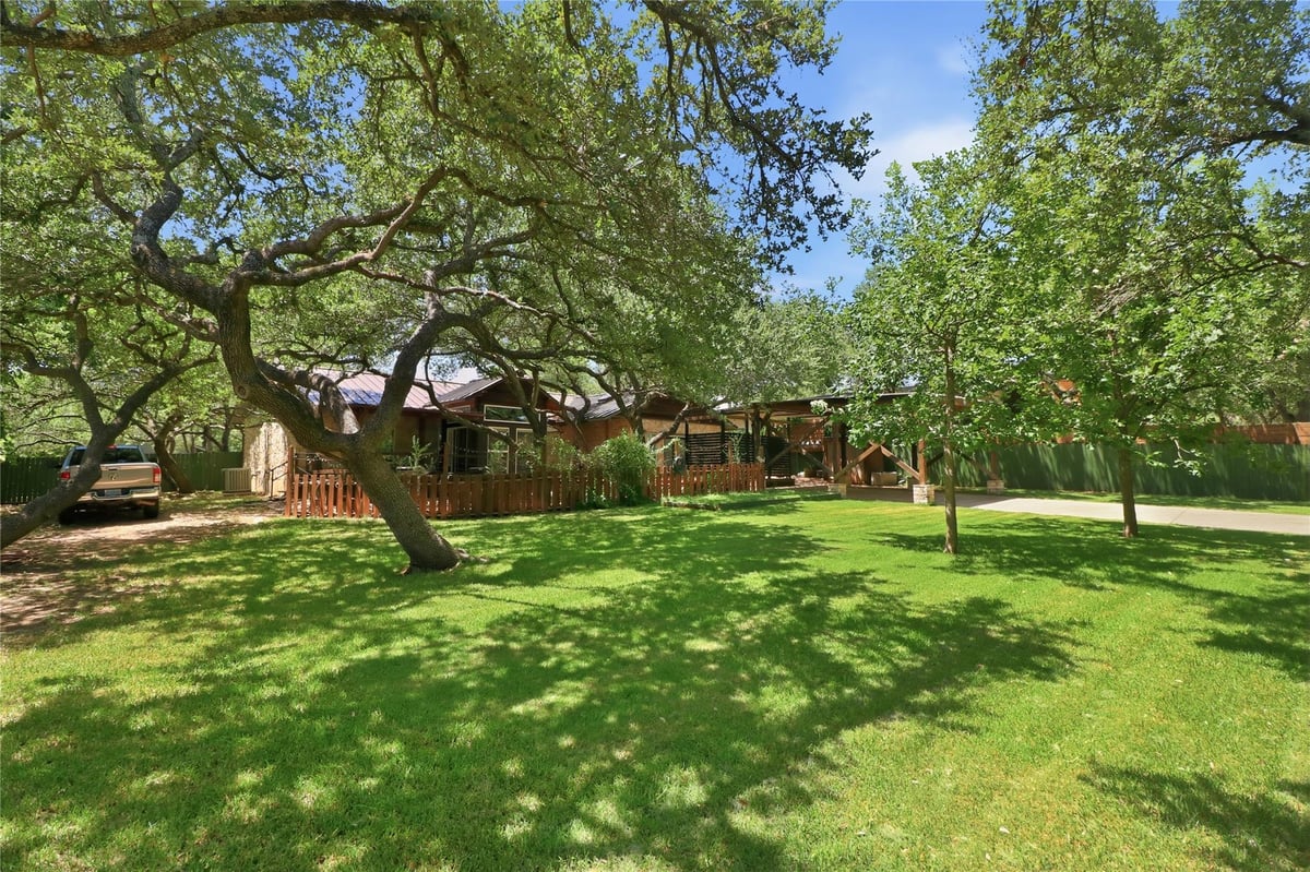 View 102 N Lake Hills DR in Lake Ridge Estates Sec 02 102 N Lake Hills DR - front exterior - Luxury home in Lake Ridge Estates Sec 02, Austin, TX