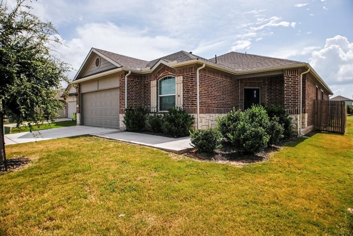 View 102 Rainmaker CV in Pecan Park Sec 7 102 Rainmaker CV - property photo 1 - Luxury home in Pecan Park Sec 7, Bastrop, TX