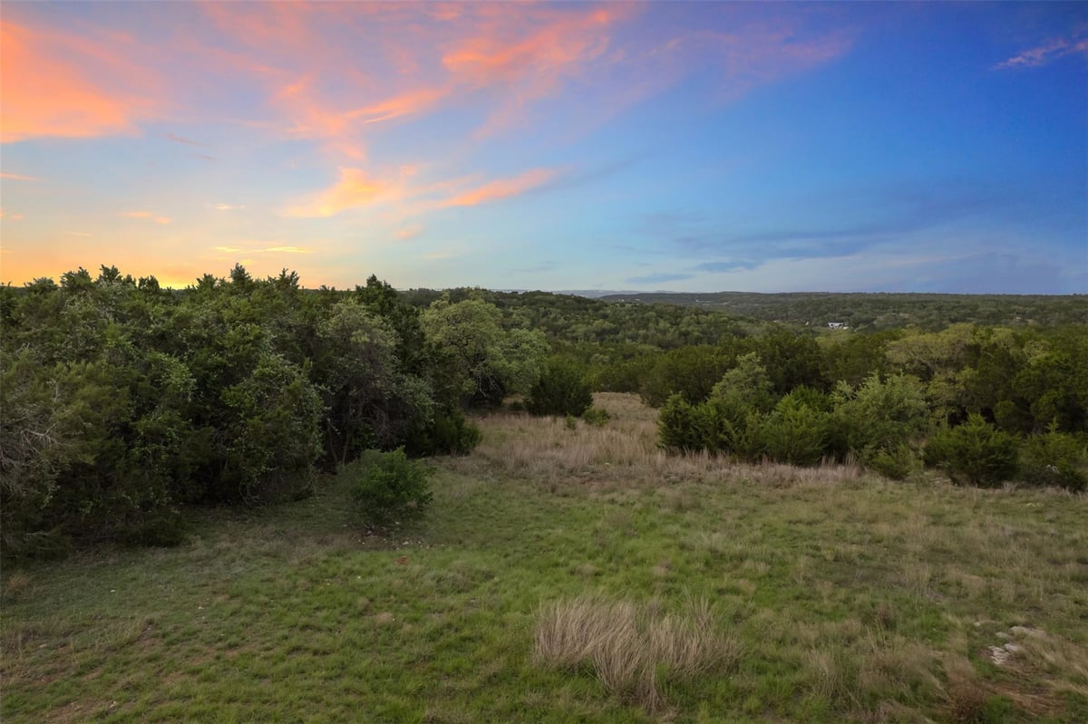 View 102 Rocky Creek RD in Bell Spgs Ranches 102 Rocky Creek RD - front exterior - Luxury lot in Bell Spgs Ranches, Dripping Springs, TX
