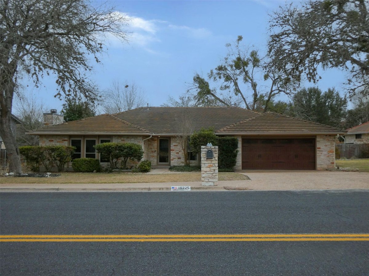 View 10225 PINEHURST Dr in Onion Creek Sec 05-B 10225 PINEHURST Dr - front exterior - Luxury home in Onion Creek Sec 05-B, Austin, TX