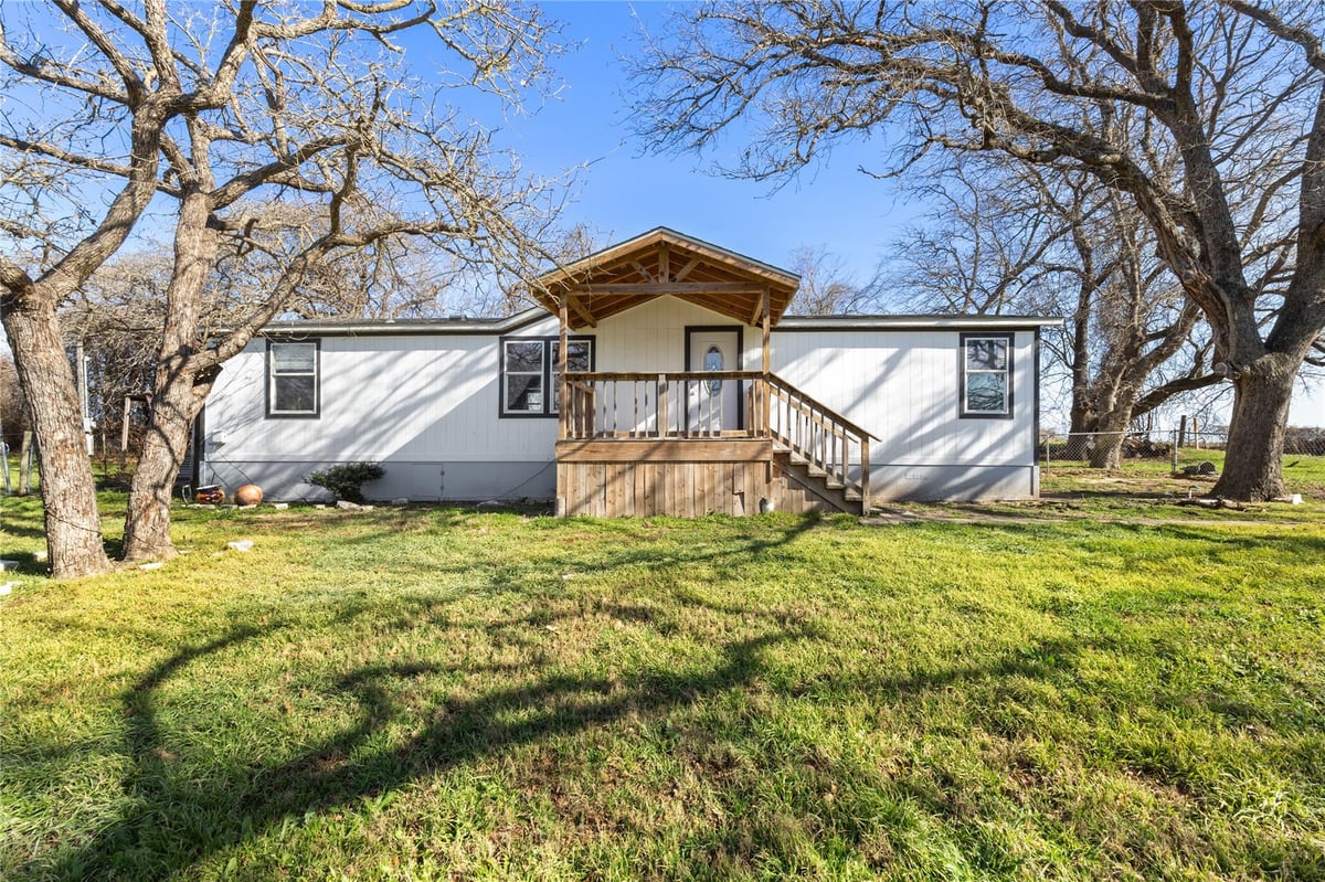 View 1029 Old Mcdade RD Unit #C in Garretson, Thomas 1029 Old Mcdade RD Unit #C - front exterior - Luxury home in Garretson, Thomas, Elgin, TX