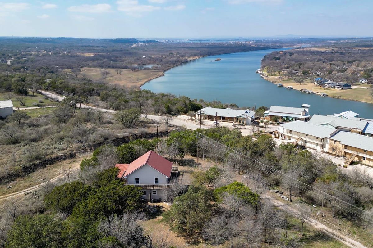 View 103 Palmie Ln in Lake Marble Falls 103 Palmie Ln - front exterior - Luxury lot in Lake Marble Falls, Marble Falls, TX