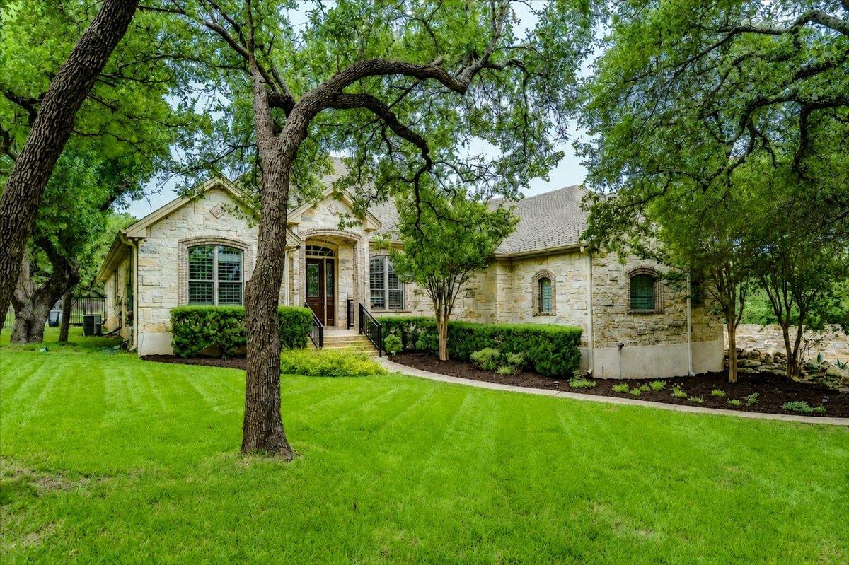 103 Silverstone DR - front exterior - Luxury home in Woods Fountainwood Ph 01b, Georgetown, TX