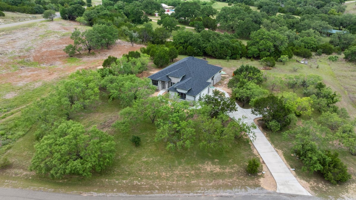 View 103 Westcreek DR in Whitewater Springs 103 Westcreek DR - front exterior - Luxury home in Whitewater Springs, Bertram, TX