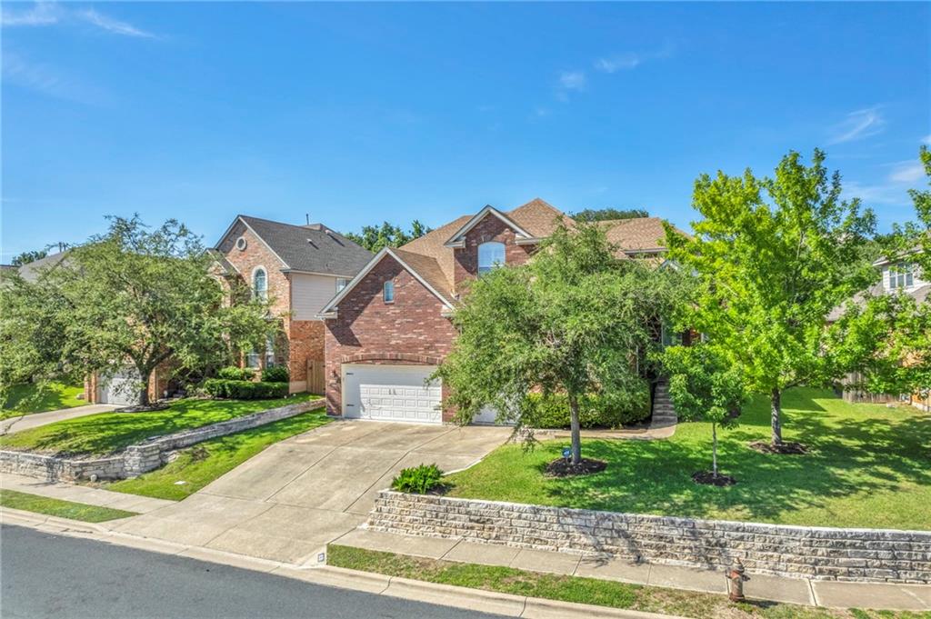 View 10301 Chestnut Ridge Rd in Canyon Creek Sec 28 10301 Chestnut Ridge Rd - front exterior - Luxury home in Canyon Creek Sec 28, Austin, TX