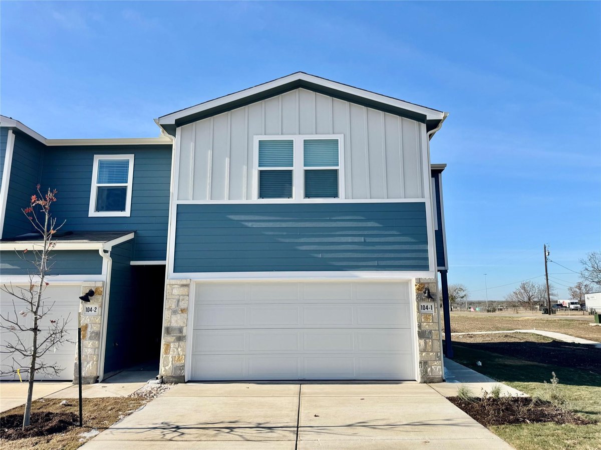 View 104 Calcite Rd Unit #1 in Waterstone 104 Calcite Rd Unit #1 - front exterior - Luxury home in Waterstone, Kyle, TX