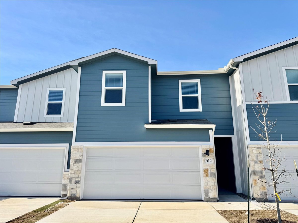 View 104 Calcite Rd Unit #2 in Waterstone Village 104 Calcite Rd Unit #2 - front exterior - Luxury home in Waterstone Village, Kyle, TX