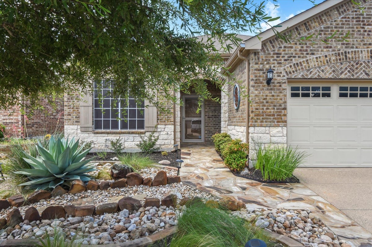 View 104 Coffee Mill Creek RD in Sun City Georgetown 104 Coffee Mill Creek RD - front exterior - Luxury home in Sun City Georgetown, Georgetown, TX
