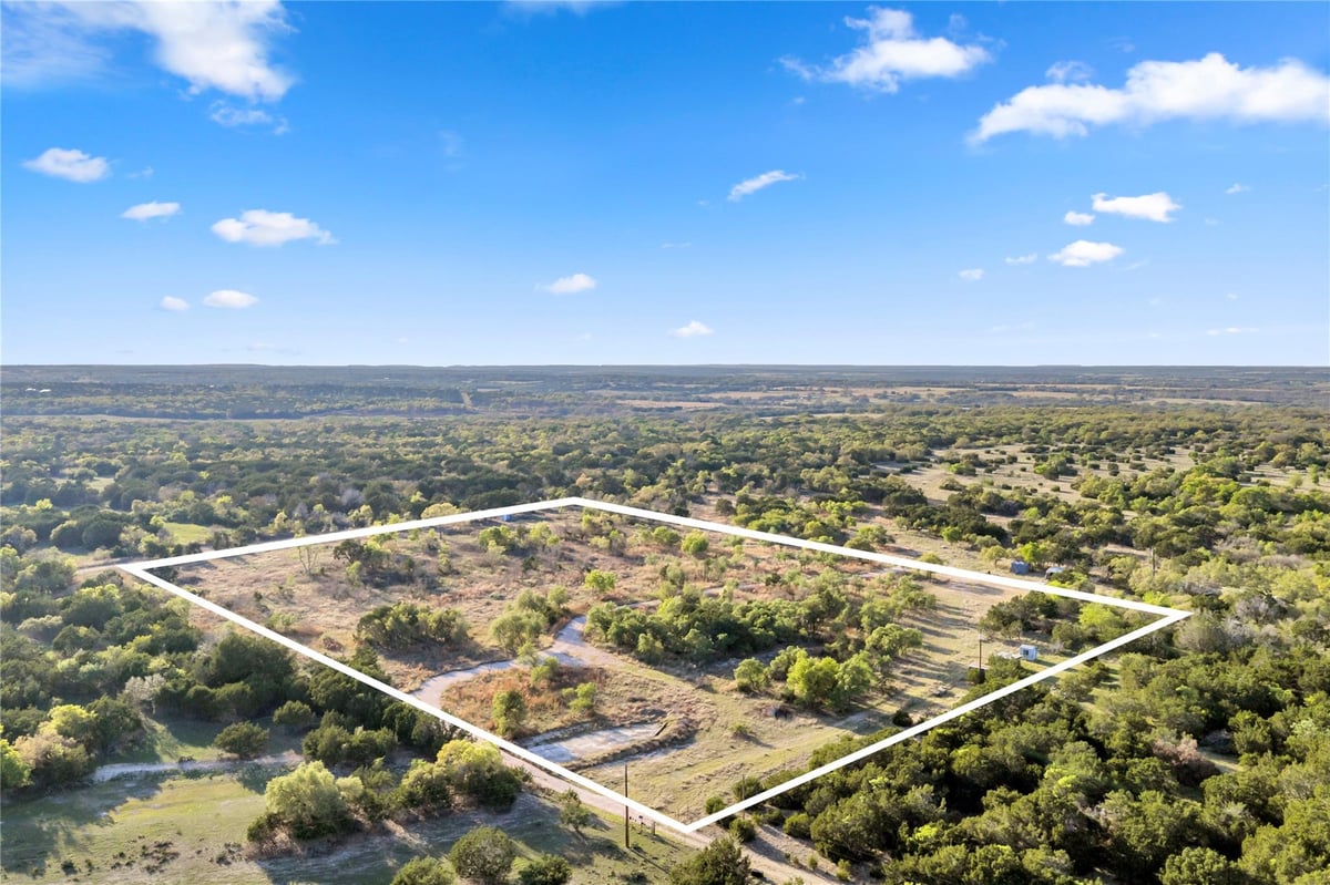 View 104 County Road 323A in COUNTY LINE ACREAGE EAST 104 County Road 323A - front exterior - Luxury home in COUNTY LINE ACREAGE EAST, Liberty Hill, TX