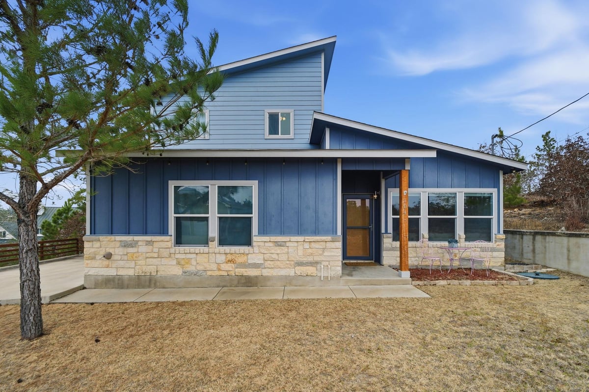 View 104 Kahalulu Dr in Tahitian Village, 104 Kahalulu Dr - front exterior - Luxury home in Tahitian Village,, Bastrop, TX