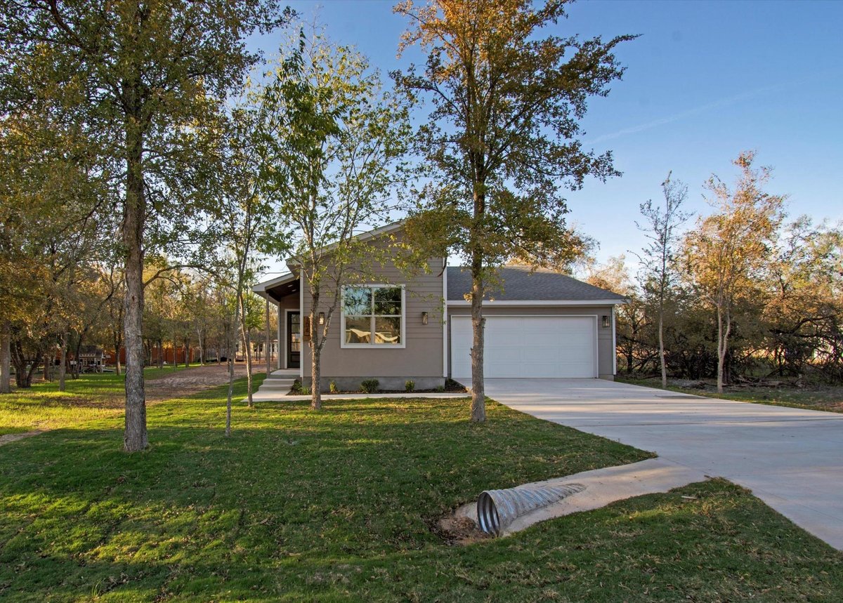 View 104 Kipapa Ct in Tahitian Village, 104 Kipapa Ct - front exterior - Luxury home in Tahitian Village,, Bastrop, TX