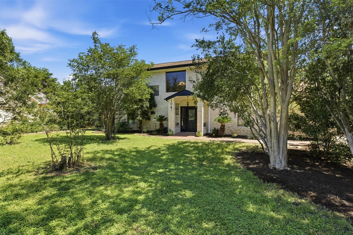 View 104 Morning Cloud ST in Lakeway Sec 24-C 104 Morning Cloud ST - front exterior - Luxury home in Lakeway Sec 24-C, Austin, TX