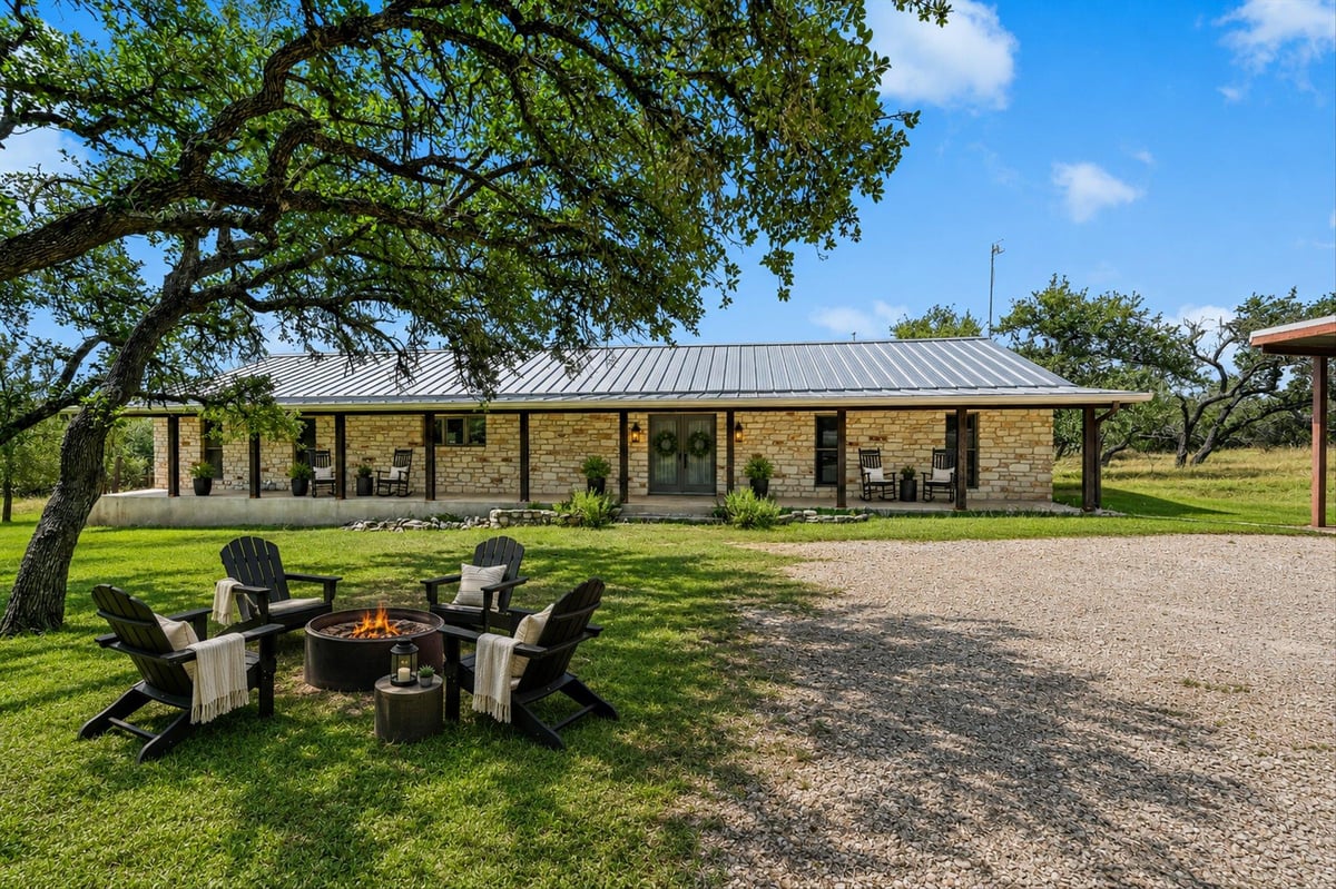View 104 Sendero Arbolado in LAS LOMAS 104 Sendero Arbolado - front exterior - Luxury home in LAS LOMAS, Wimberley, TX