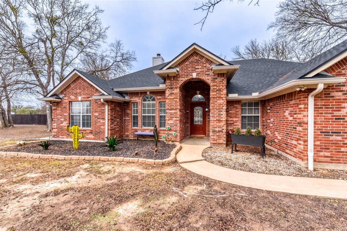 View 104 Spring Br in Jacobs Landing 104 Spring Br - front exterior - Luxury home in Jacobs Landing, Bastrop, TX