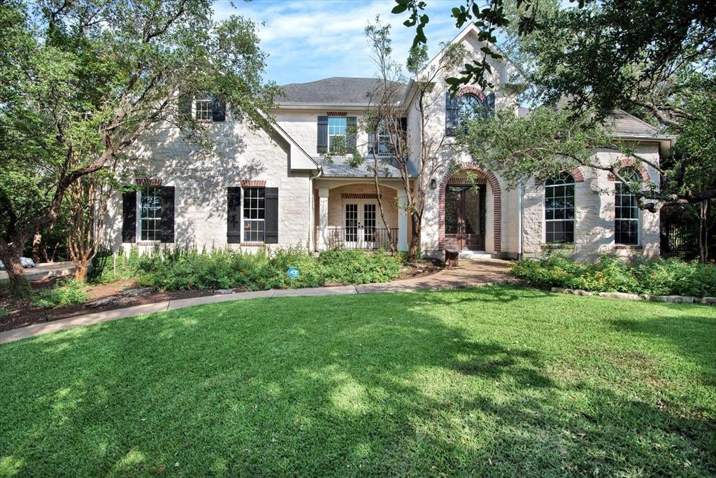 View 10401 Jennys Jump Dr in Sterling Acres 10401 Jennys Jump Dr - front exterior - Luxury home in Sterling Acres, Austin, TX