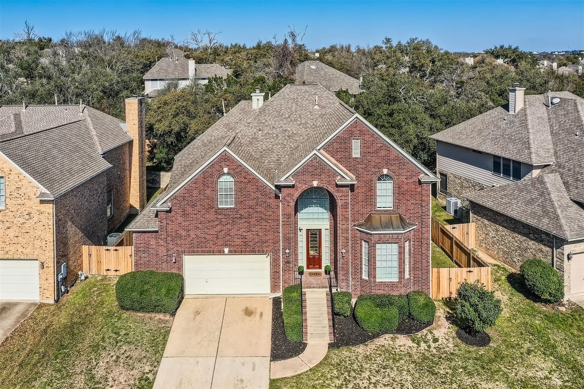 View 10404 Canyon Vista Way in Canyon Creek Sec 23 10404 Canyon Vista Way - front exterior - Luxury home in Canyon Creek Sec 23, Austin, TX