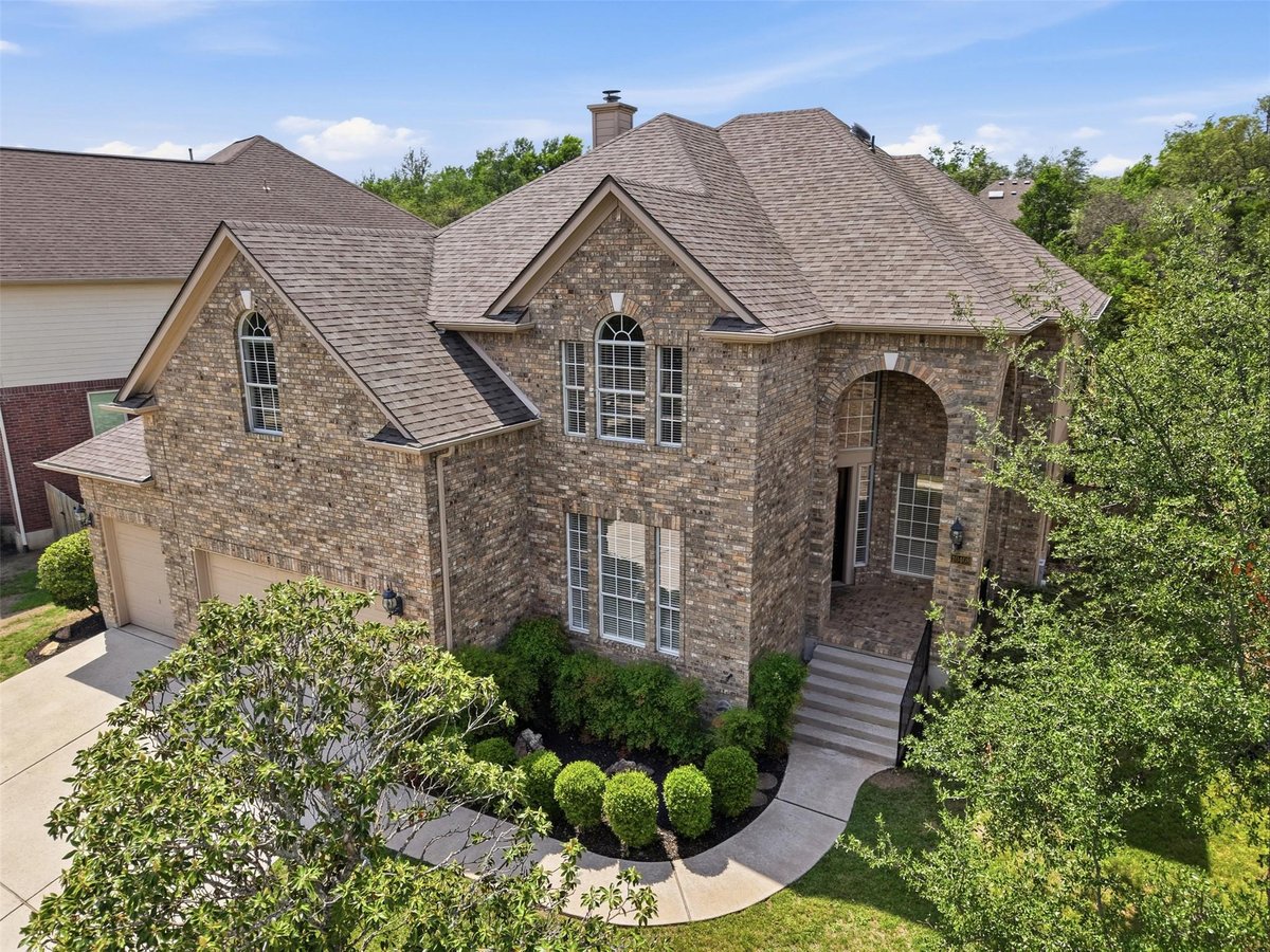View 10408 Canyon Vista Way in Canyon Creek Sec 23 10408 Canyon Vista Way - front exterior - Luxury home in Canyon Creek Sec 23, Austin, TX