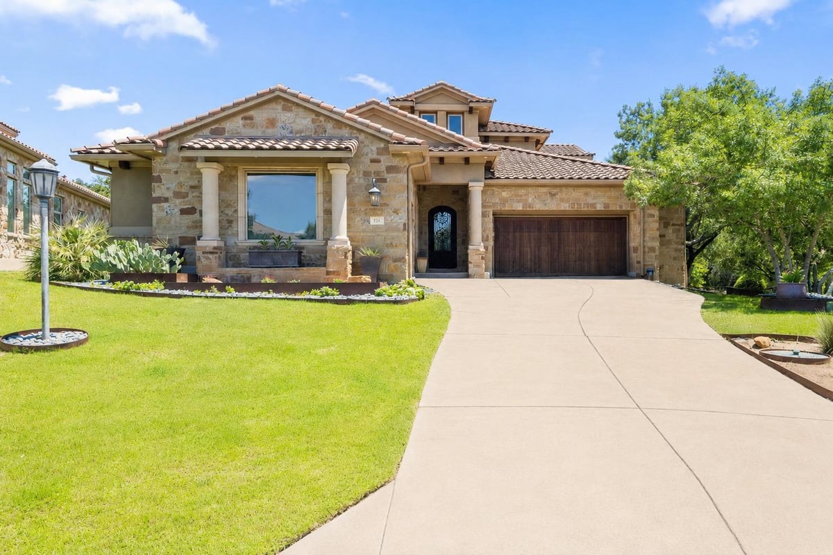 View 105 Aruba CT in Rough Hollow Sec 10 105 Aruba CT - front exterior - Luxury home in Rough Hollow Sec 10, Lakeway, TX