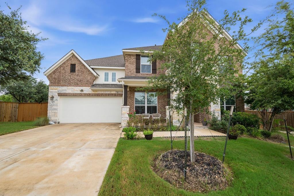 View 105 Autumn Oak Way in PARKSIDE ON THE RIVER 105 Autumn Oak Way - front exterior - Luxury home in PARKSIDE ON THE RIVER, Georgetown, TX