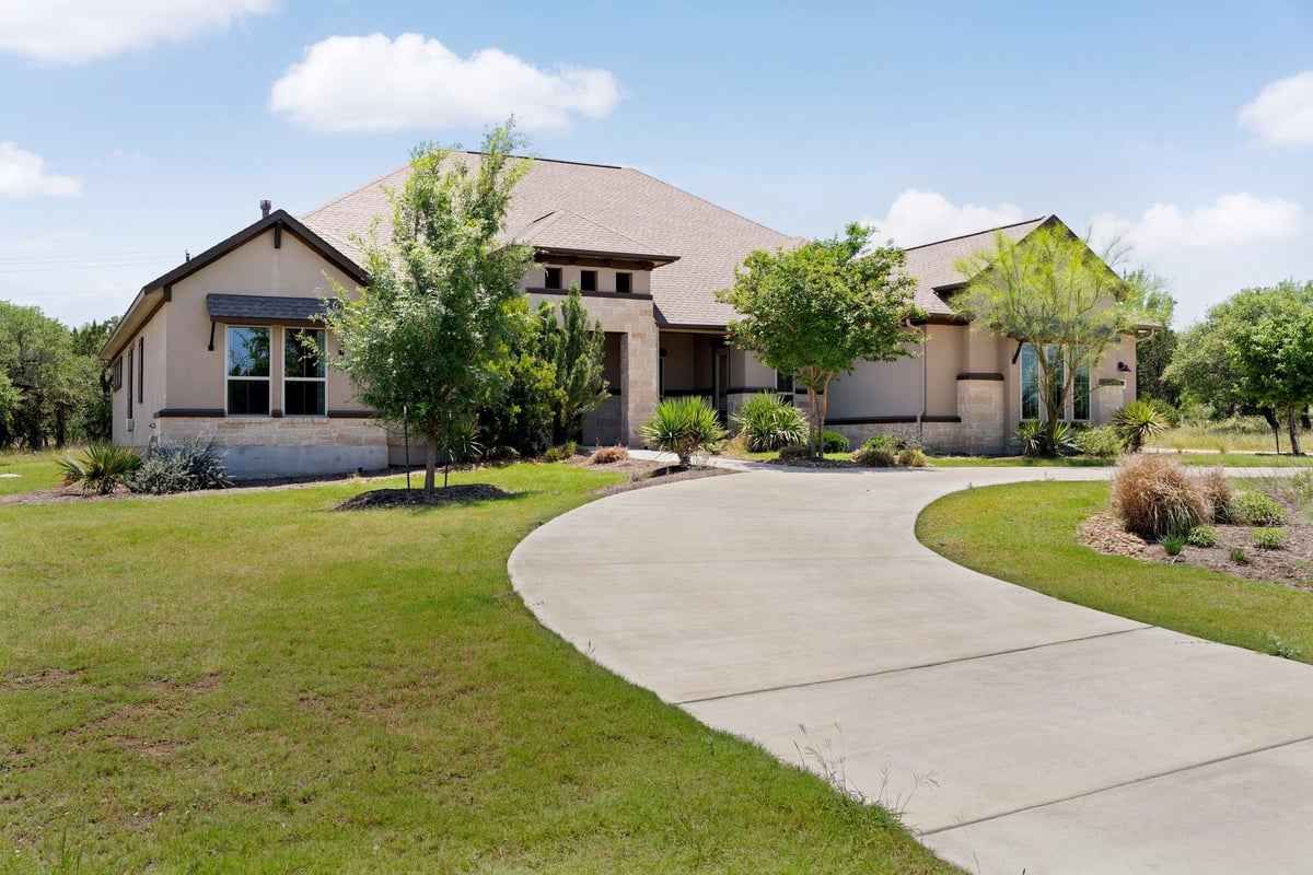 View 105 Council Oak Ct in Spicewood Trails 105 Council Oak Ct - front exterior - Luxury home in Spicewood Trails, Spicewood, TX