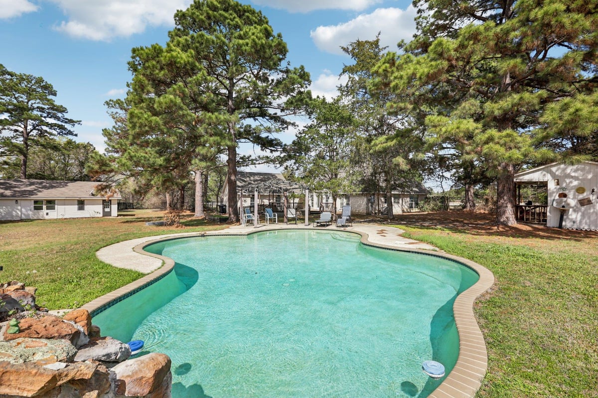 View 105 Daisy Ln in Circle D 105 Daisy Ln - front exterior - Luxury home in Circle D, Bastrop, TX