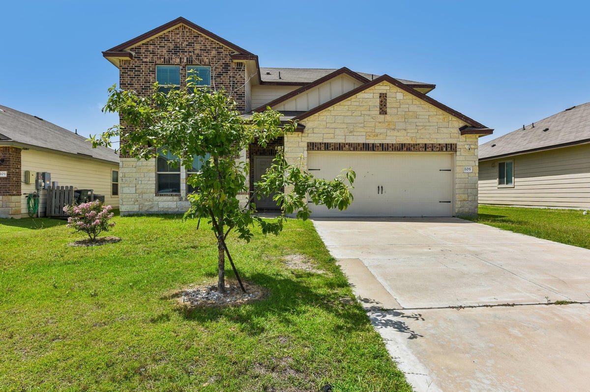 View 105 Green Jay Dr in SONTERRA 105 Green Jay Dr - front exterior - Luxury home in SONTERRA, Jarrell, TX
