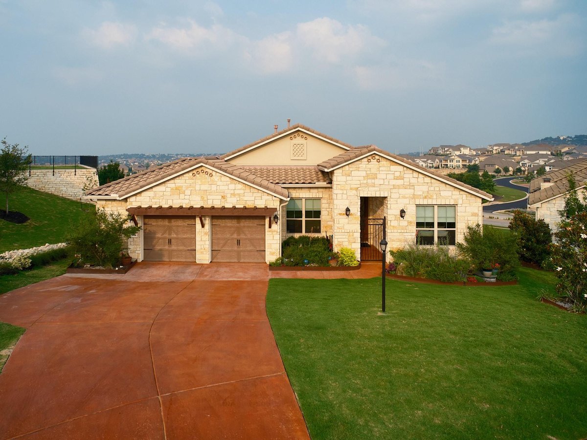 View 105 Majestic Arroyo Way in Rough Hollow 105 Majestic Arroyo Way - front exterior - Luxury home in Rough Hollow, Austin, TX