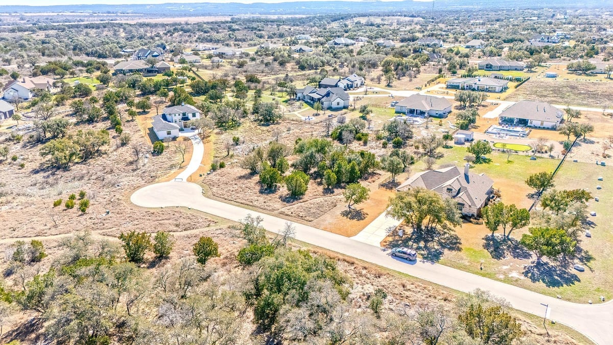 View 105 Rocky Summit Ct in Spicewood Trails 105 Rocky Summit Ct - front exterior - Luxury lot in Spicewood Trails, Spicewood, TX