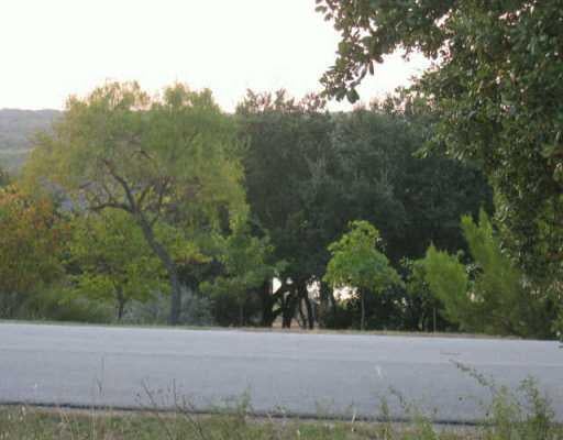 View 105 Wesley Ridge DR 105 Wesley Ridge DR - property photo 1 - Luxury lot in Spicewood, TX