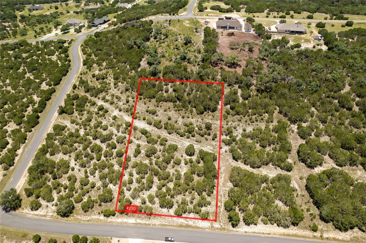 View 105 Woodhollow Dr in Whitewater Springs 105 Woodhollow Dr - front exterior - Luxury lot in Whitewater Springs, Bertram, TX