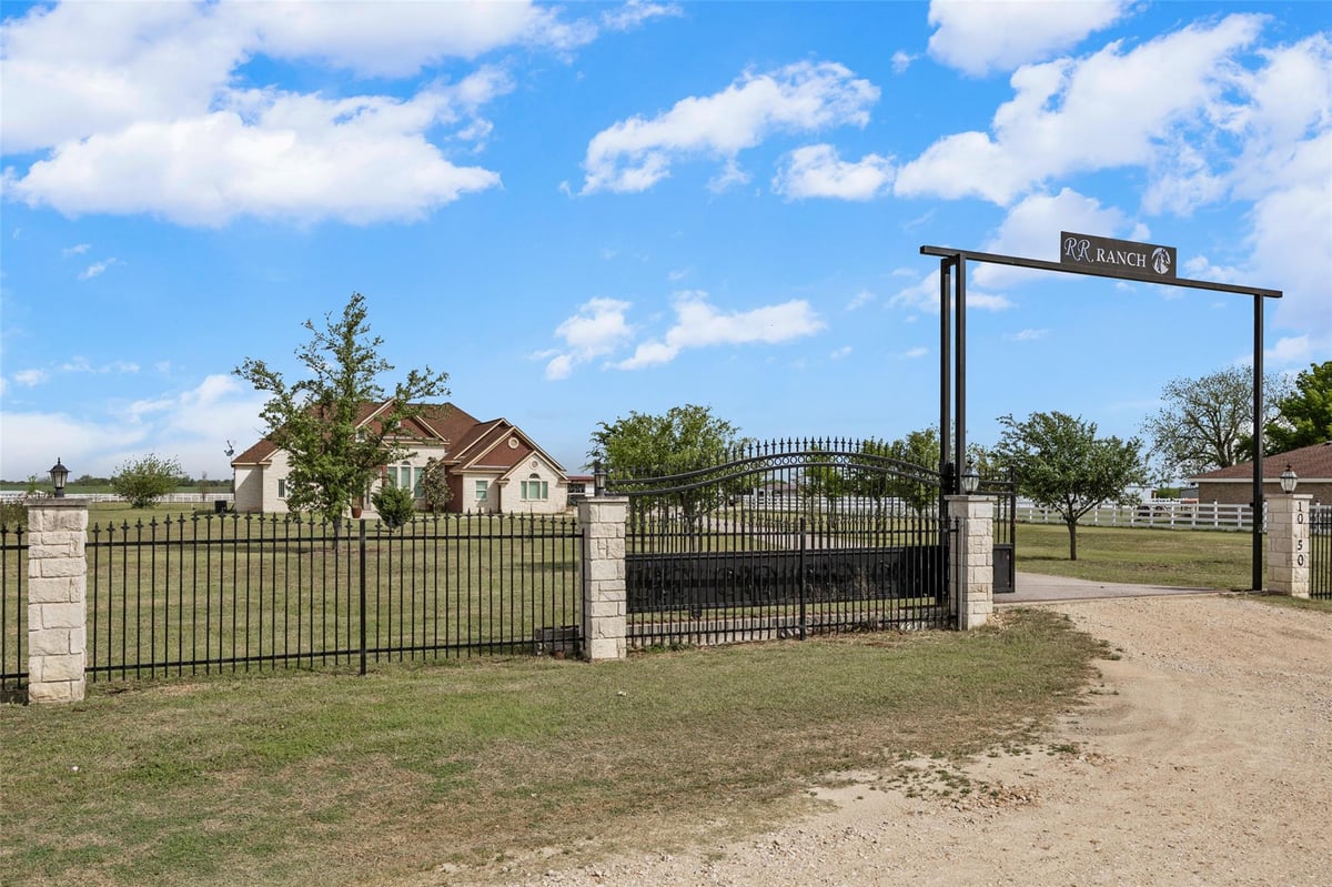 View 1050 Fm 619 RD in Josephine Milhron 1050 Fm 619 RD - front exterior - Luxury home in Josephine Milhron, Taylor, TX