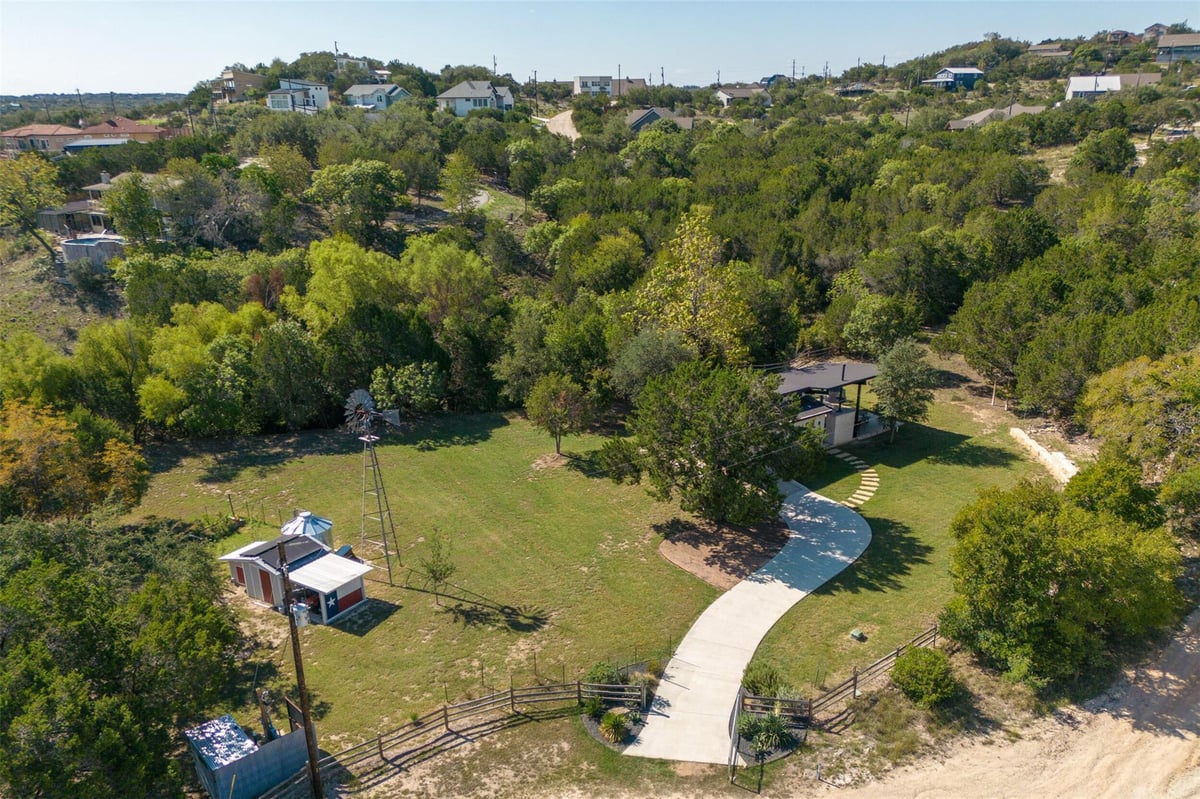 View 10501 Lake Park DR in Mountain Creek Lakes Sec 01 10501 Lake Park DR - front exterior - Luxury lot in Mountain Creek Lakes Sec 01, Dripping Springs, TX
