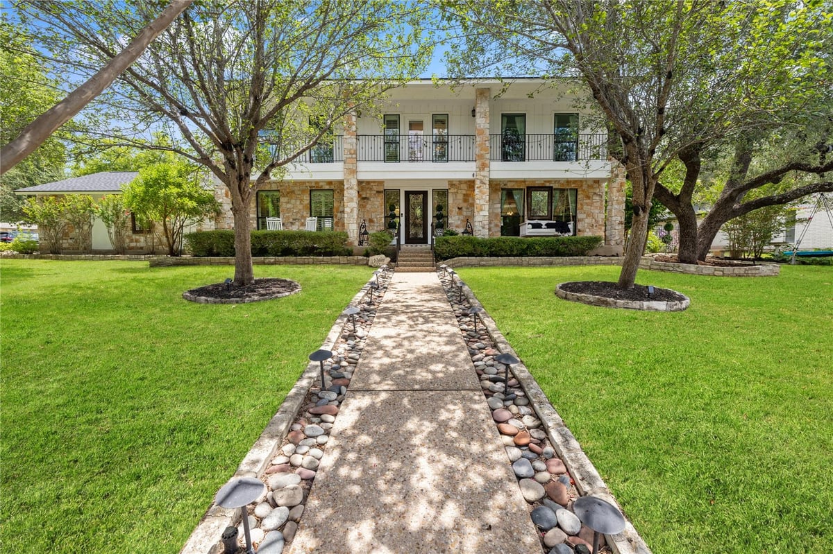 View 10507 Plumewood DR in Spicewood At Balcones Villages 10507 Plumewood DR - front exterior - Luxury home in Spicewood At Balcones Villages, Austin, TX