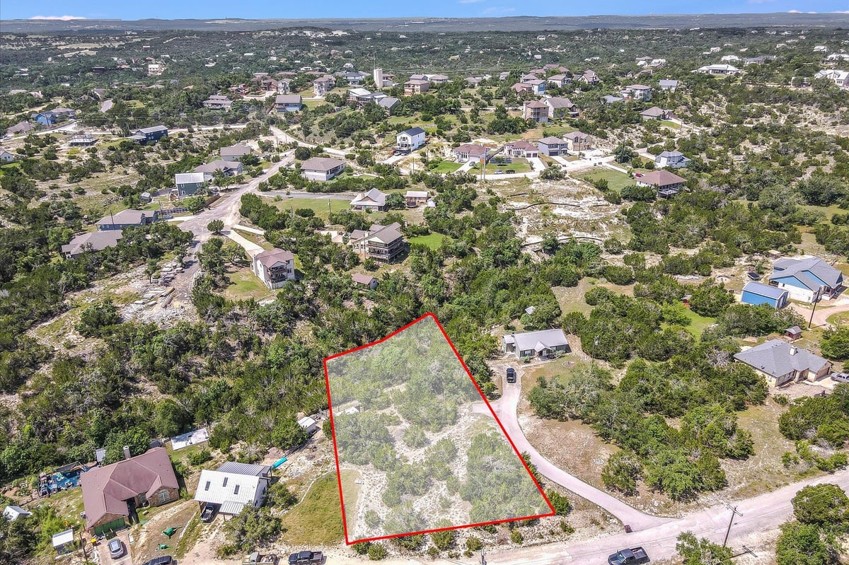 View 10511 Lake Park Dr in Mountain Creek Lakes 10511 Lake Park Dr - front exterior - Luxury lot in Mountain Creek Lakes, Dripping Springs, TX