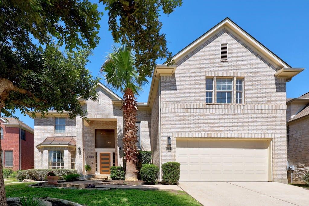 View 10524 Canyon Vista Way in Canyon Creek Sec 23 10524 Canyon Vista Way - front exterior - Luxury home in Canyon Creek Sec 23, Austin, TX
