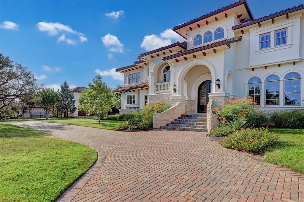 View 106 Bella Cima Dr in Costa Bella 106 Bella Cima Dr - front exterior - Luxury home in Costa Bella, Austin, TX