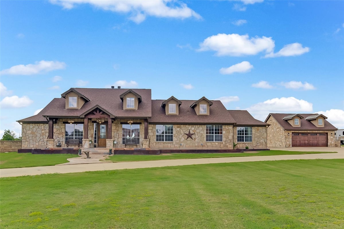 View 106 Deep Lake Dr in River Bend Oaks 106 Deep Lake Dr - front exterior - Luxury home in River Bend Oaks, Liberty Hill, TX