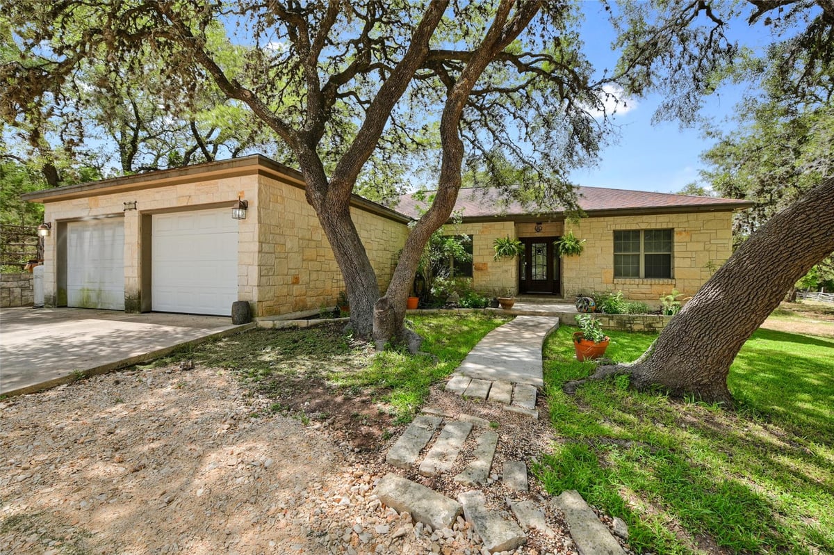 View 106 Masonic Lodge Rd in Texas Central Railway Co Surv 106 Masonic Lodge Rd - front exterior - Luxury home in Texas Central Railway Co Surv, Wimberley, TX