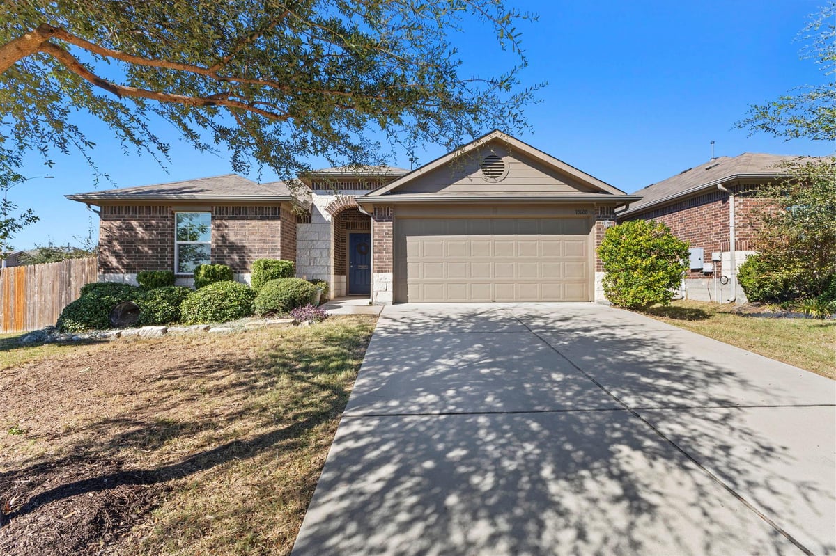 View 10600 Menominee Falls LN in Pioneer Xing East Sec 3B 10600 Menominee Falls LN - front exterior - Luxury home in Pioneer Xing East Sec 3B, Austin, TX