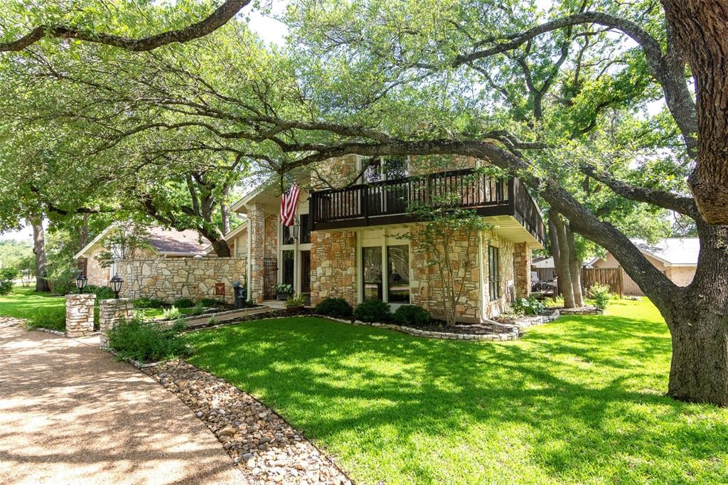 View 10602 Spicewood Pkwy in Spicewood At Balcones Villages 10602 Spicewood Pkwy - front exterior - Luxury home in Spicewood At Balcones Villages, Austin, TX