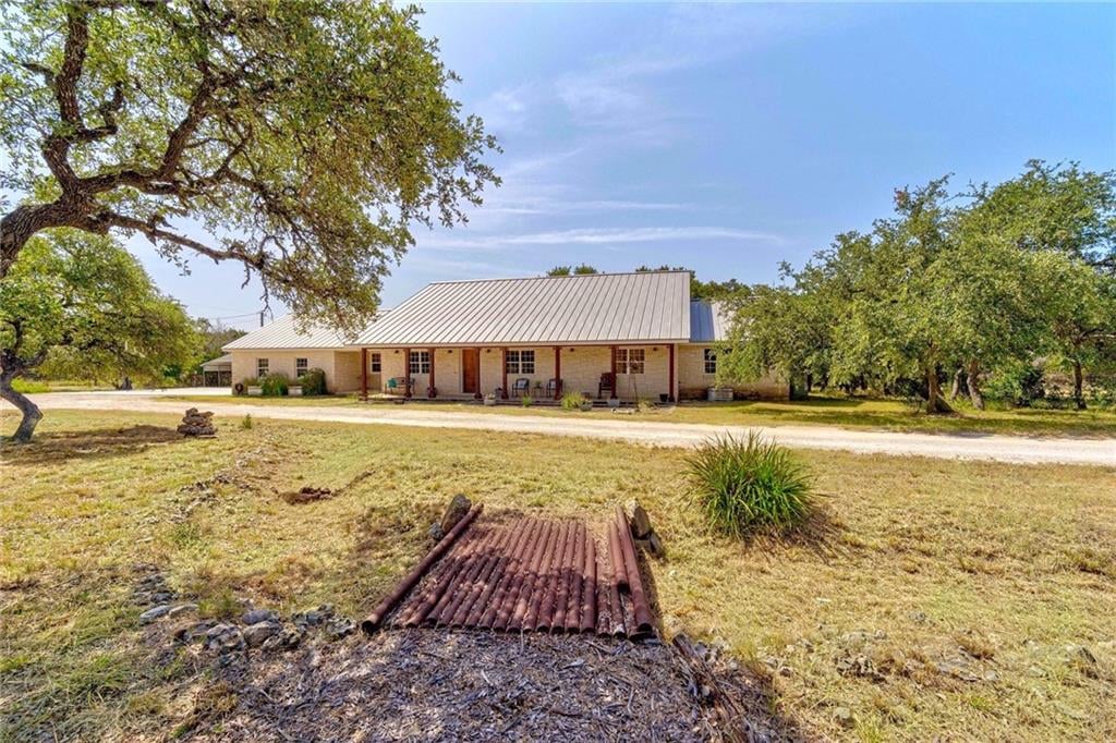 View 1061 Fischer Store RD 1061 Fischer Store RD - front exterior - Luxury home in Wimberley, TX