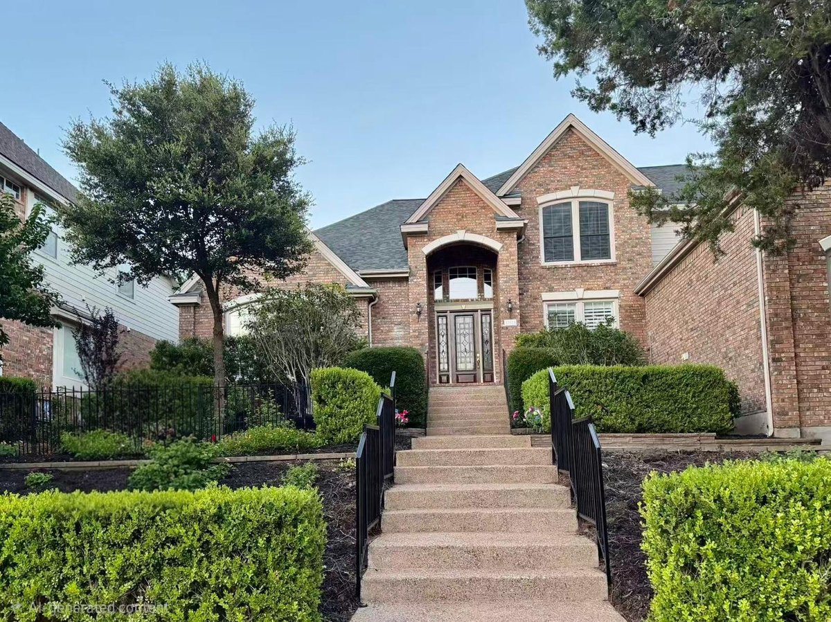 View 10623 Winchelsea DR in Spicewood At Bullcreek Sec 04 10623 Winchelsea DR - front exterior - Luxury home in Spicewood At Bullcreek Sec 04, Austin, TX