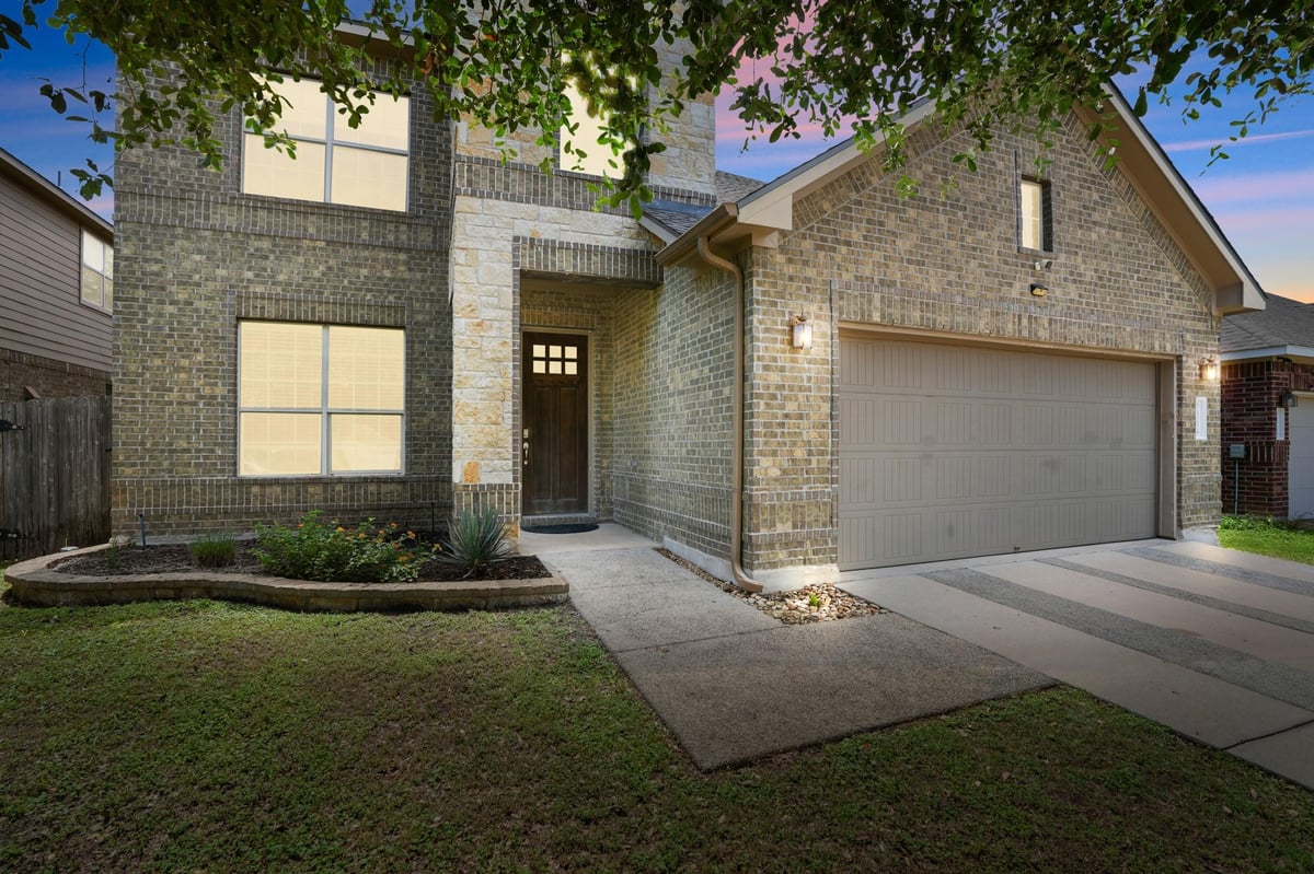 View 10624 Desert Willow LOOP in Meadows At Double Creek 10624 Desert Willow LOOP - front exterior - Luxury home in Meadows At Double Creek, Austin, TX