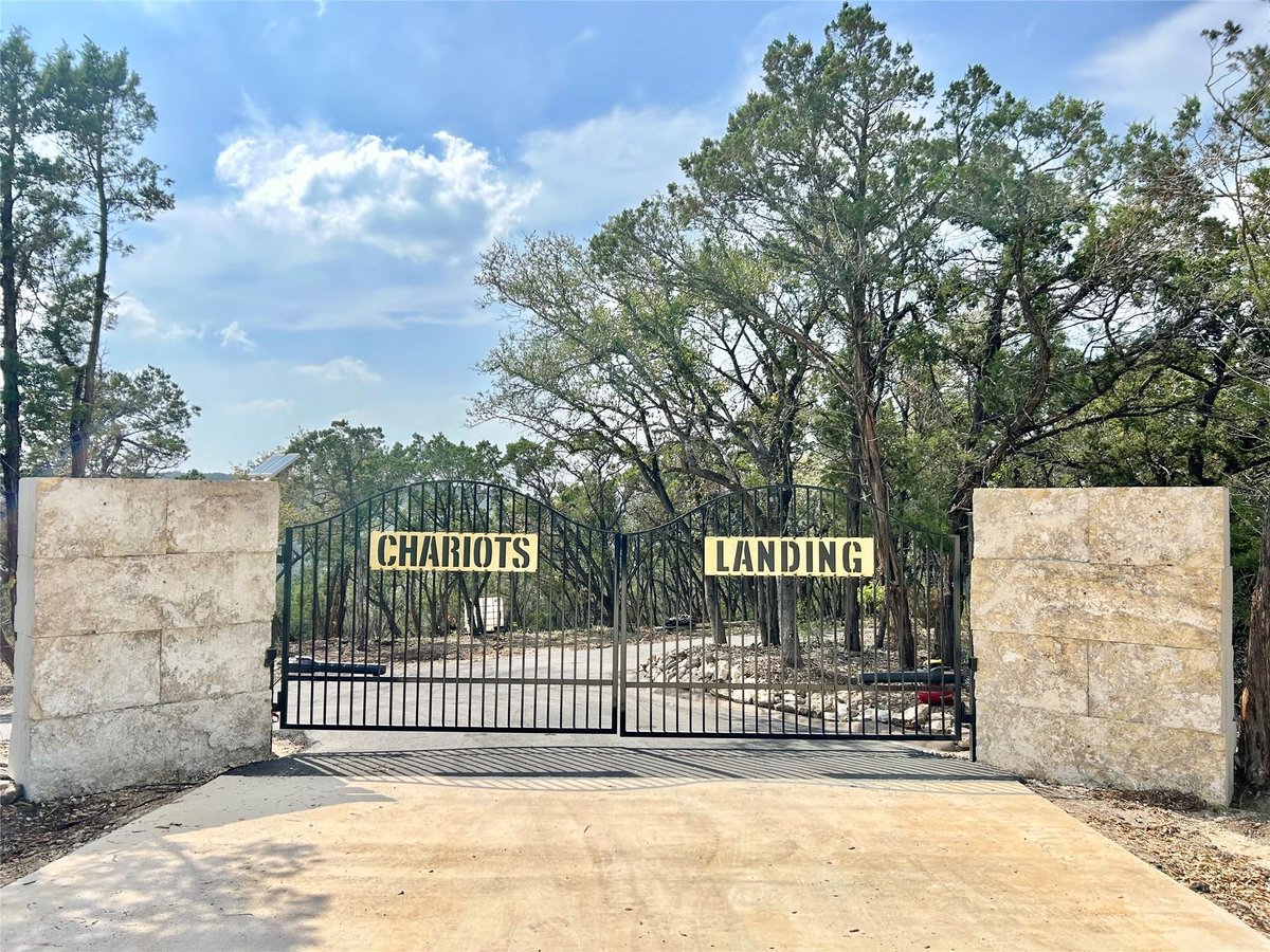 View 10651 Ranch Road 12 Un Unit #D in Chariots Landing 10651 Ranch Road 12 Un Unit #D - front exterior - Luxury lot in Chariots Landing, Wimberley, TX
